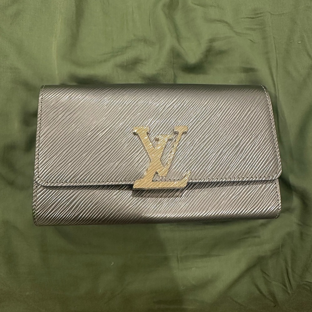 Louis Vuitton Pochette Louis Silver Clutch with Gold Accents and chain -sold out